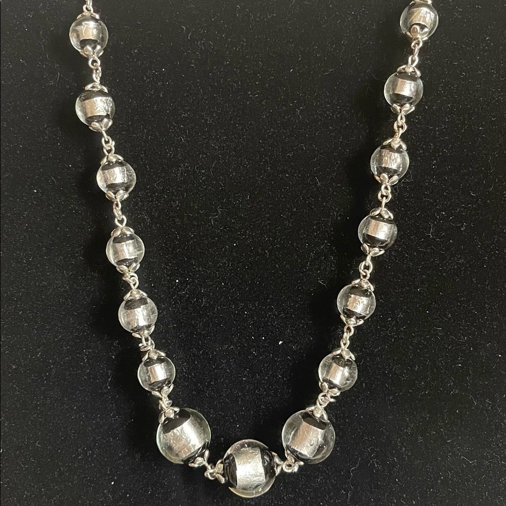 Graduated silver foil and black glass beaded choker. magnet clasp. Silver tone